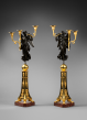 Gilt and Patinated Bronze and Marble “Fame” Candelabra
Paris, Empire period, circa 1805
Height 77 cm each